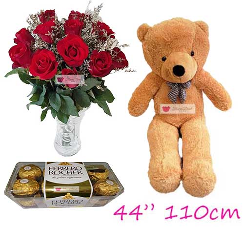 Big Love Flowers Cebu set includes; 12 Red roses in a glass vase with 16ct Ferrero and a huge 44" bear.