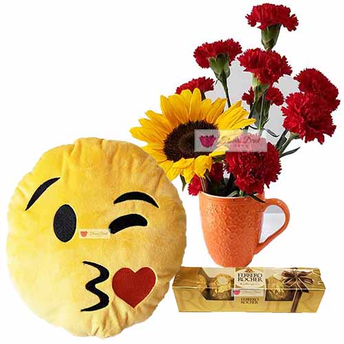 Cebu Anniversary Flowers includes; 10 Red Carnations and a sunflower in a 4" reusable coffee cup