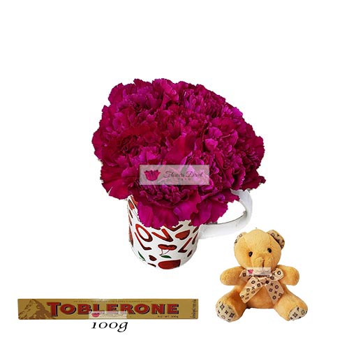 Discount Flower Bouquet Cebu 10 carnations of your color choice in a love themed coffee cup with 4 inch bear and 100 gram Toblerone. Picture is shown with Violet carnations.