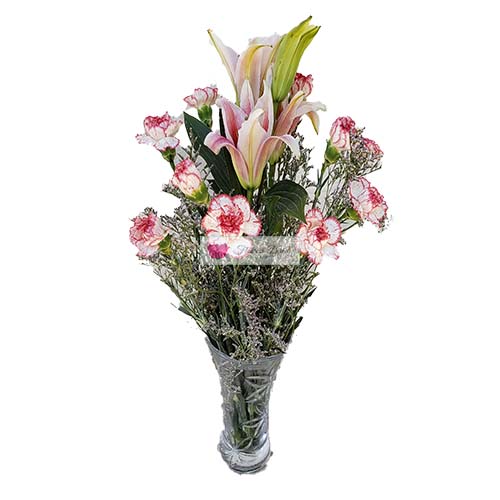 Pink Lily Carnations Vase Cebu 10 white/pink carnations and 1 stalk of 4 pink lily flowers in a clear glass vase.